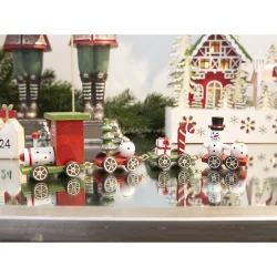 Juletog med vogne og figurer