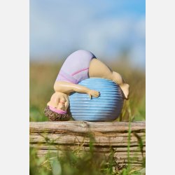 Damer i yoga-positur