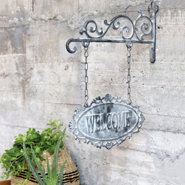 Skilt "Welcome", gr med ophng