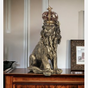 L�ve, siddende, guld